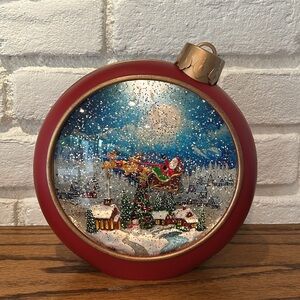 Valerie Parr Hill Illuminated Motion Glitter Santa Sleigh Snow Globe Ornament